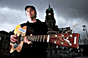 Dean in front of Birkenhead Town Hall, proposed future site of the John Peel Arts Centre